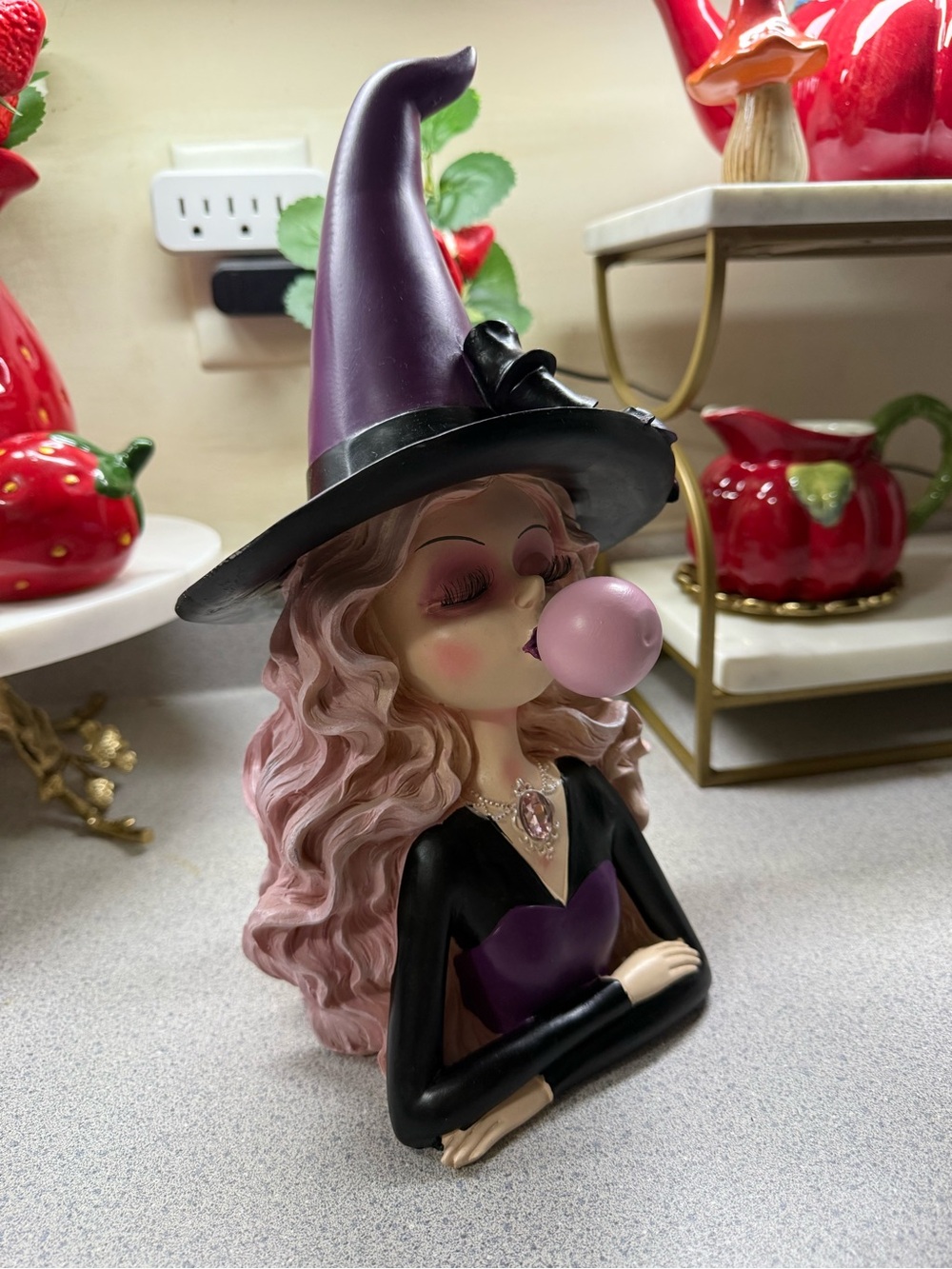 VIRAL Whimsical Bubble Gum Blowing Witch With skull and Bow Halloween Decor